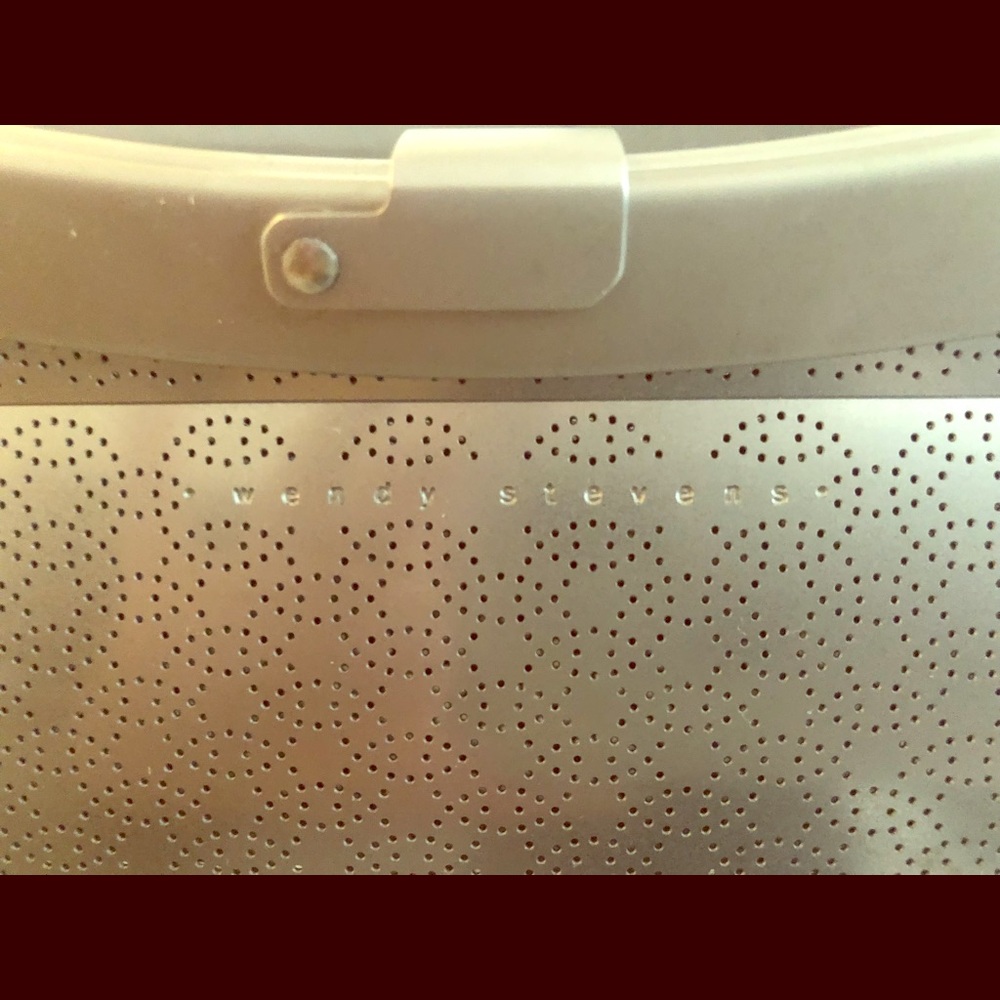 Wendy Stevens metal clutch w leather strap